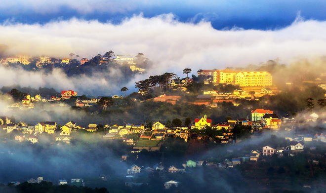 Misty sunrise in Da Lat City